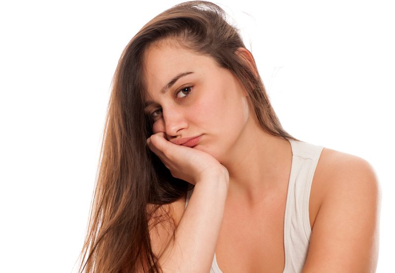 Disengaged-woman-against-a-white-background