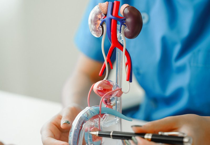 Doctor-with-an-injection-in-hand-for-male-health-issues Doctor-with-an-injection-in-hand-for-male-health-issues