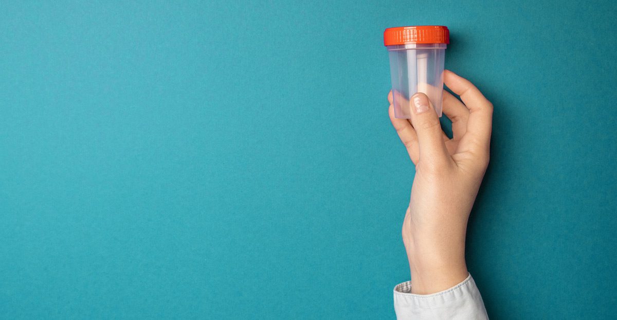 doctor-holding-plastic-container doctor-holding-plastic-container