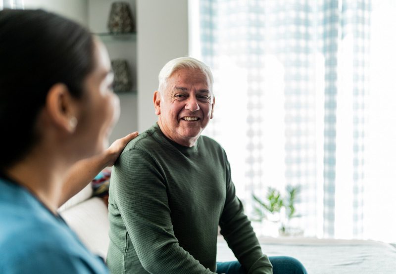 man-discussing-options-with-doctor