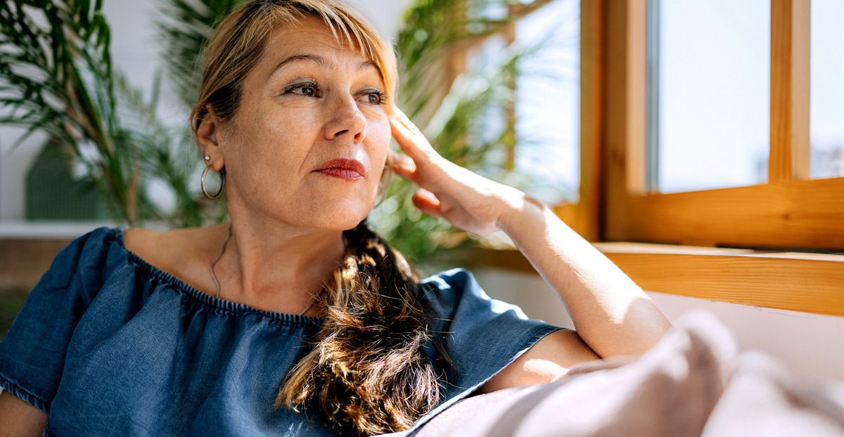 mature-woman-seated-on-couch