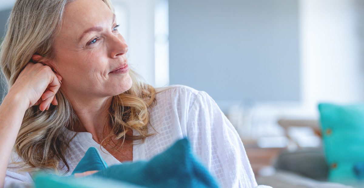 woman relaxed on couch woman relaxed on couch