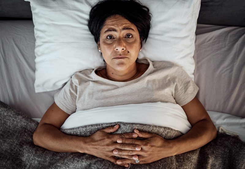woman-staring-at-ceiling-wide-awake woman-staring-at-ceiling-wide-awake