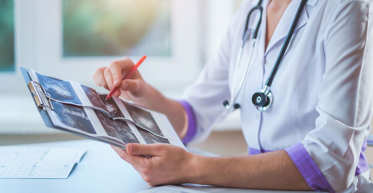 Doctor-reviewing-imaging-of-urinary-tract