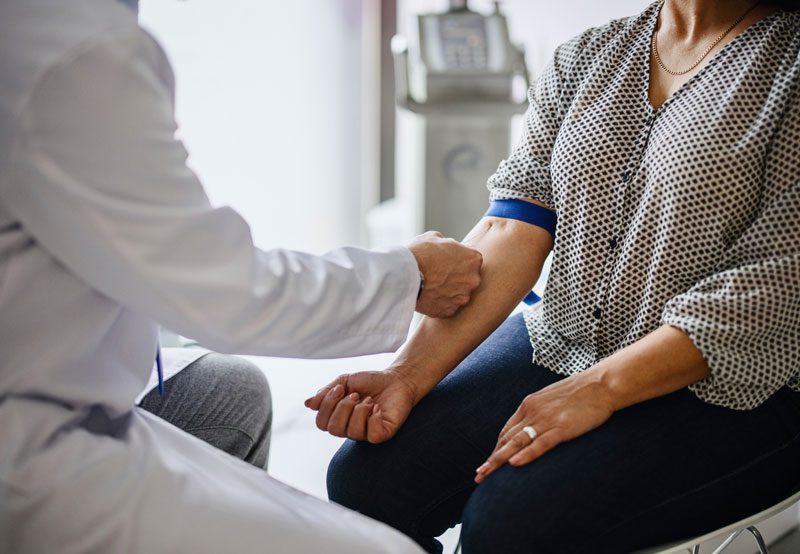 Mature-woman-receiving-menopause-hormone-replacement-therapy