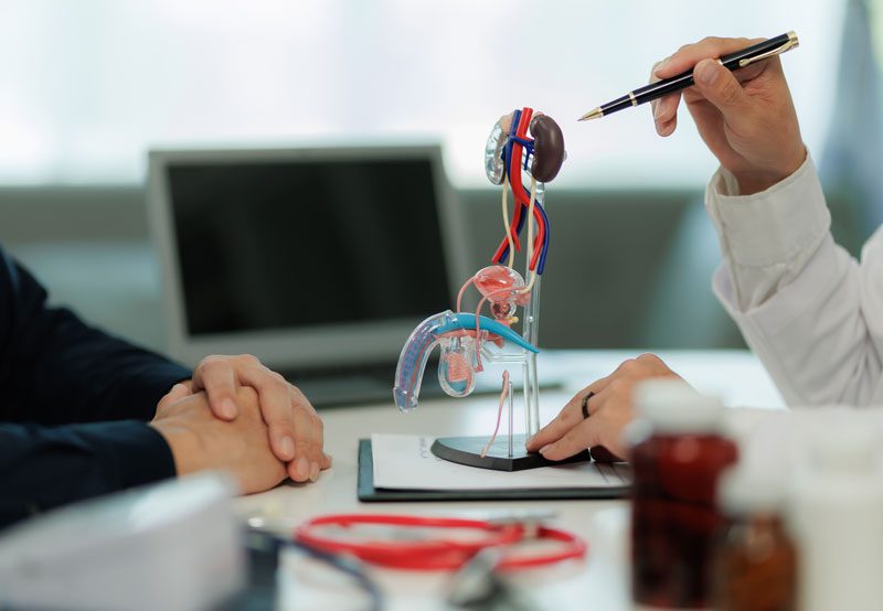 Urologist-giving-consultation-to-male-patient