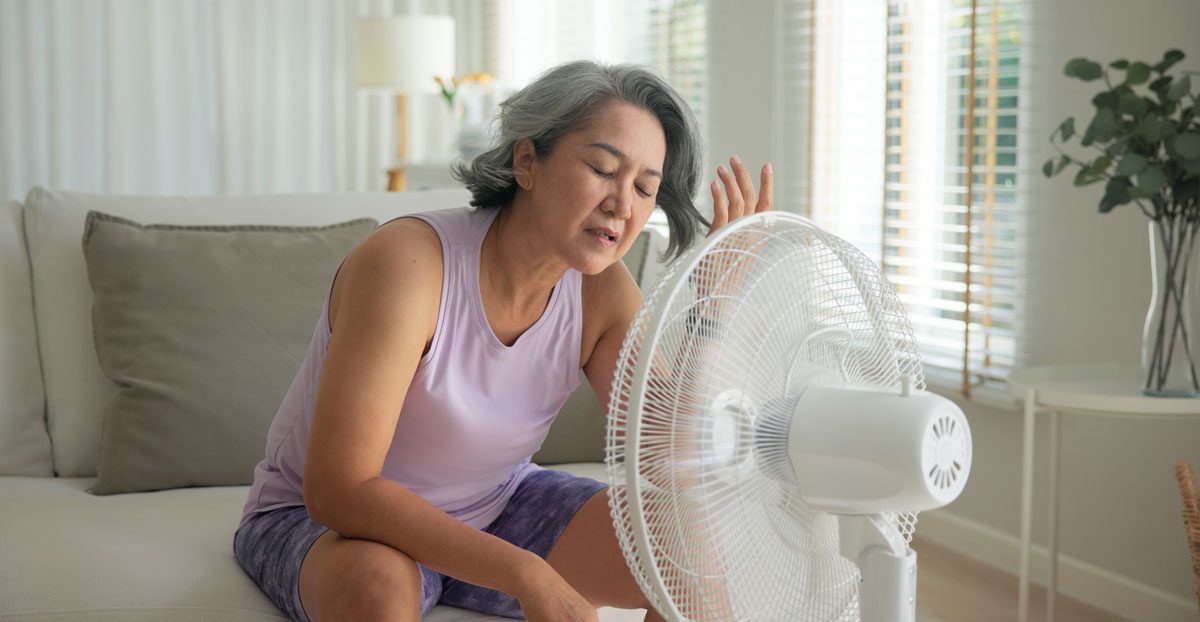 Woman-experiencing-hot-flashes